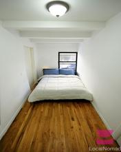 bright bedroom with double bed
